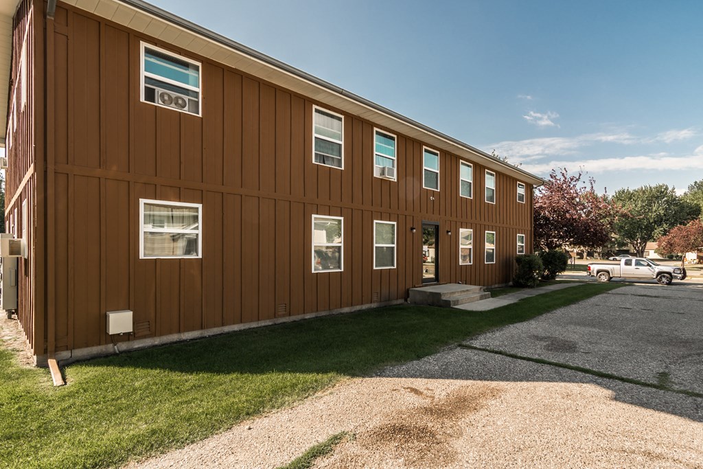 Grand Forks, ND Claremont Apartments. brick exterior of the two-level apartment building
