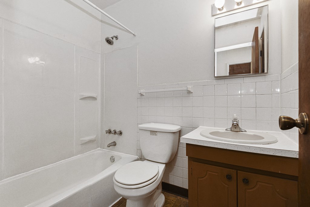 West St. Paul, MN Covington Courts Apartments. A bathroom with a sink toilet and bathtub