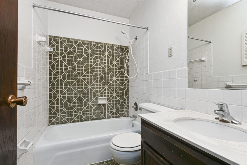 Fridley, MN Georgetown Apartments | Bathroom Fridley, MN Georgetown Apartments. A bathroom with a sink toilet and bathtub - Photo Gallery