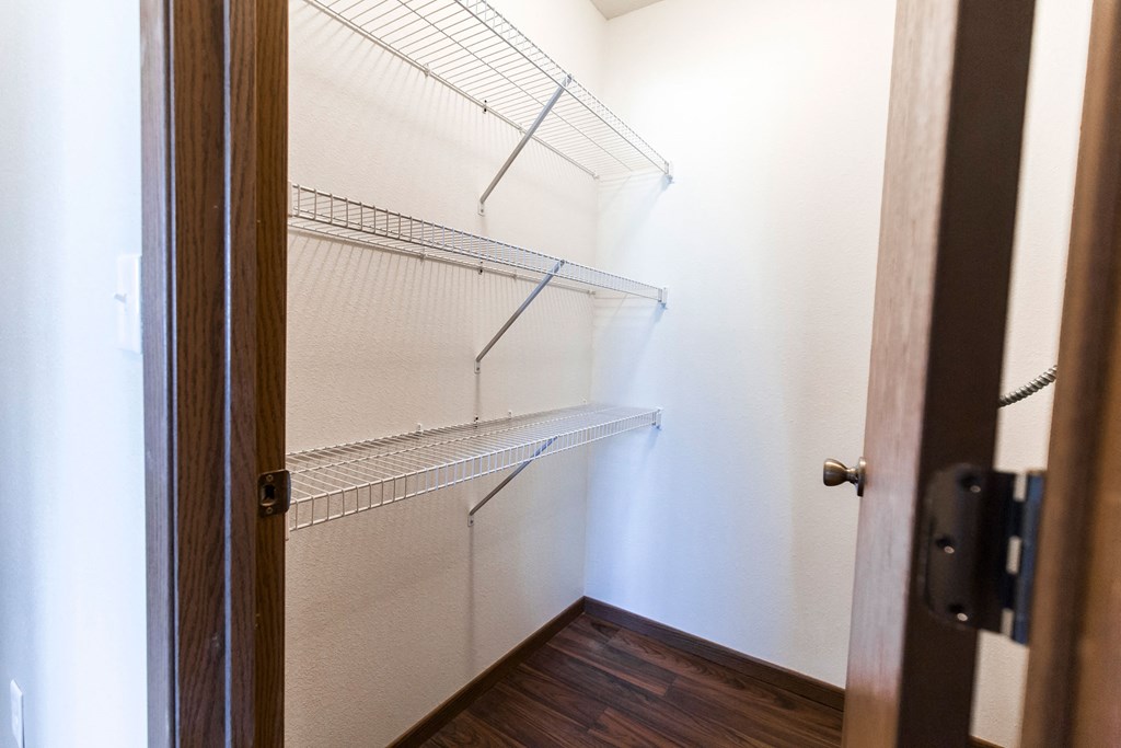 Grand Forks, ND Library Lane Apartments a walk in closet in a 555 waverly unit