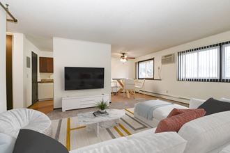 Montreal Courts Apartments | Two Bedroom | Living Room & Dining Area - Photo Gallery 4