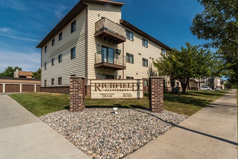 an apartment building with a sign  at Harrison and Richfield, Grand Forks, ND