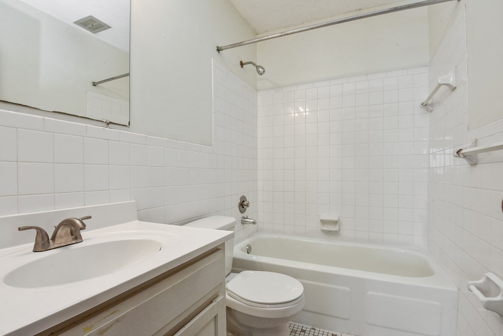 a bathroom with a sink toilet and bathtub | Sage Park New Brighton, MN