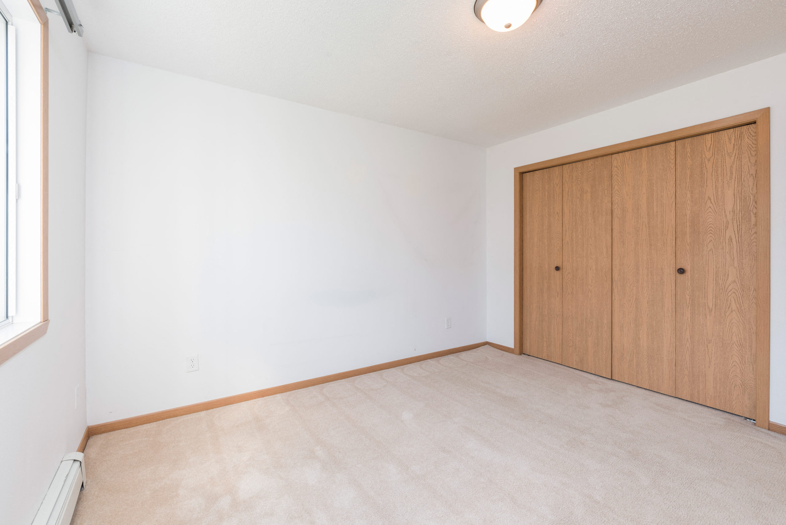 Sierra Ridge Apartments in Bismarck, ND | 2 Bdrm-Plan D-Bedroom