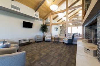 Bismarck, ND Stonefield Apartments.  A large community room with a fireplace