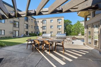 The Edge of Uptown Apartments | Patio with Furniture