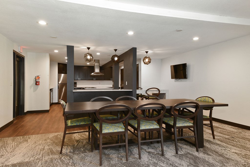 The Edge of Uptown Apartments | Community Room Dining Area