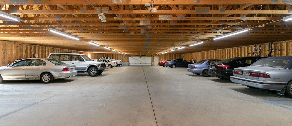 a underground garage with cars. Fargo, ND Sunrise North
