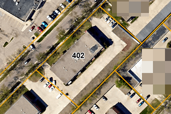 an aerial view of a parking lot with a 404 sign