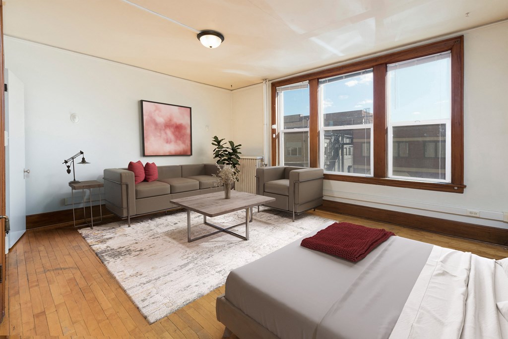 Bismarck, ND Mason Apartment. The space showcases a comfortable living area and a relaxing sleeping area. It's a compact and inviting living space designed for convenience and comfort.