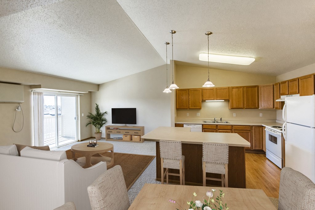 Living Room and Kitchen Area at Sunset Ridge Apartments in Bismarck, ND
