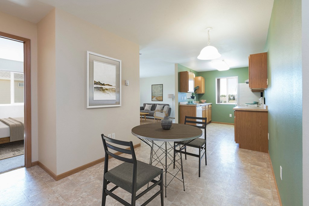Kitchen with Green Walls at Sunset Ridge Apartments in Bismarck, ND