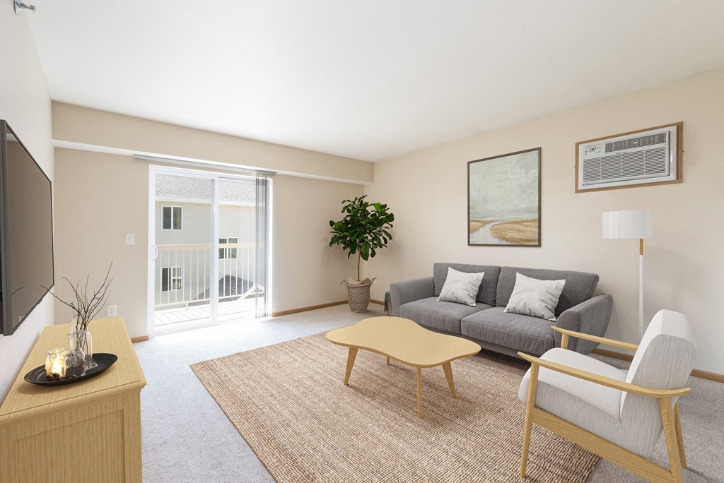 Bright Living Room at Sunset Ridge Apartments in Bismarck, ND