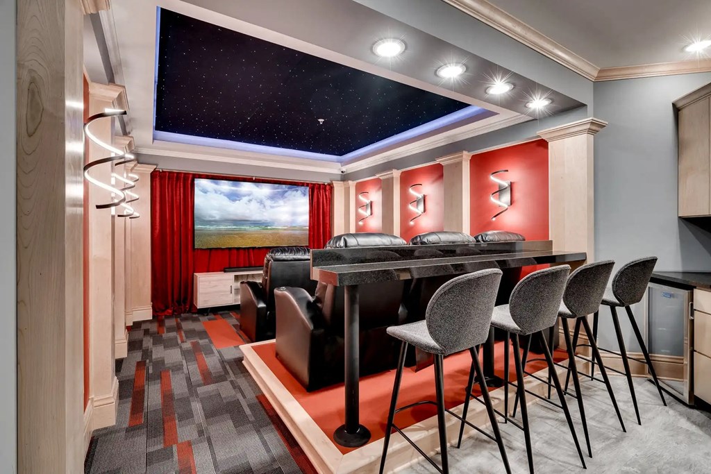 a bar in a room with a table and chairs. Circle Pines, MN Lexington Lofts