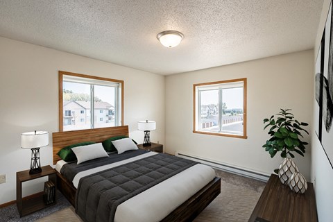 a bedroom with a bed and two windows