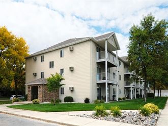 A three story apartment building. Fargo, ND Briar Pointe Apartments.