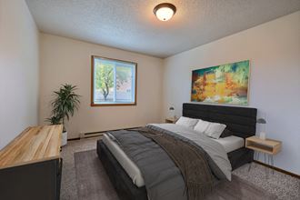 Fargo, ND Brownstone Apartments. the bedroom in a two bedroom apartment at the enclave at woodbridge apartments in sugar land,