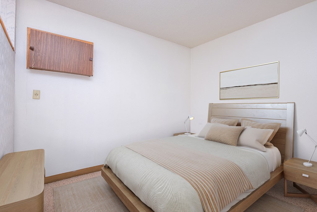 Fargo, ND Cityside Apartments a bedroom with a bed and a nightstand