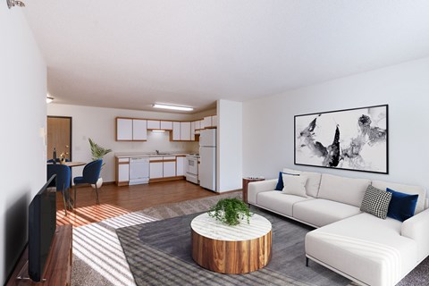 a living room with a white couch and a table