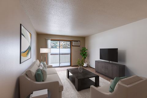 a living room with a couch and a coffee table and a tv. Fargo, ND Long Island Apartments