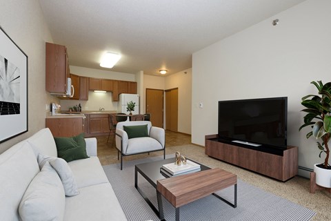 a living room with a couch and a coffee table