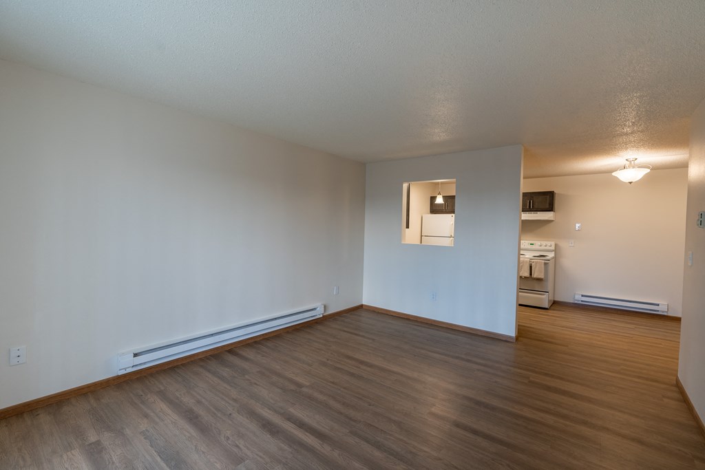 Fargo, ND Parkside Apartments. A living room with a hardwood floor
