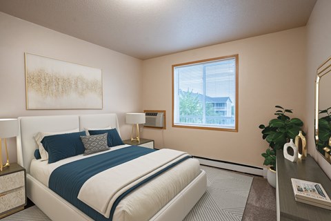 a bedroom with a bed and a window. Fargo, ND West Lake Apartments