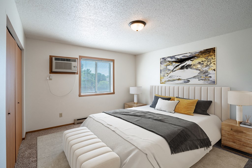 Fargo, ND Westview Towers Apartments | Bedroom the master bedroom has a king sized bed and a large window
