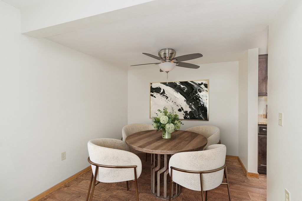Golden Valley, MN Valley View Apartments | 22B | Dining a dining room with a table with four chairs around it. Golden Valley, MN Valley View Apartments
