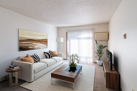 a living room with a couch and a coffee table