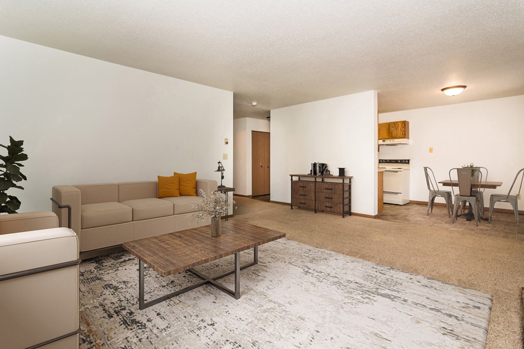 Grand Forks, ND Columbia West Apartments a living room with a couch and a coffee table