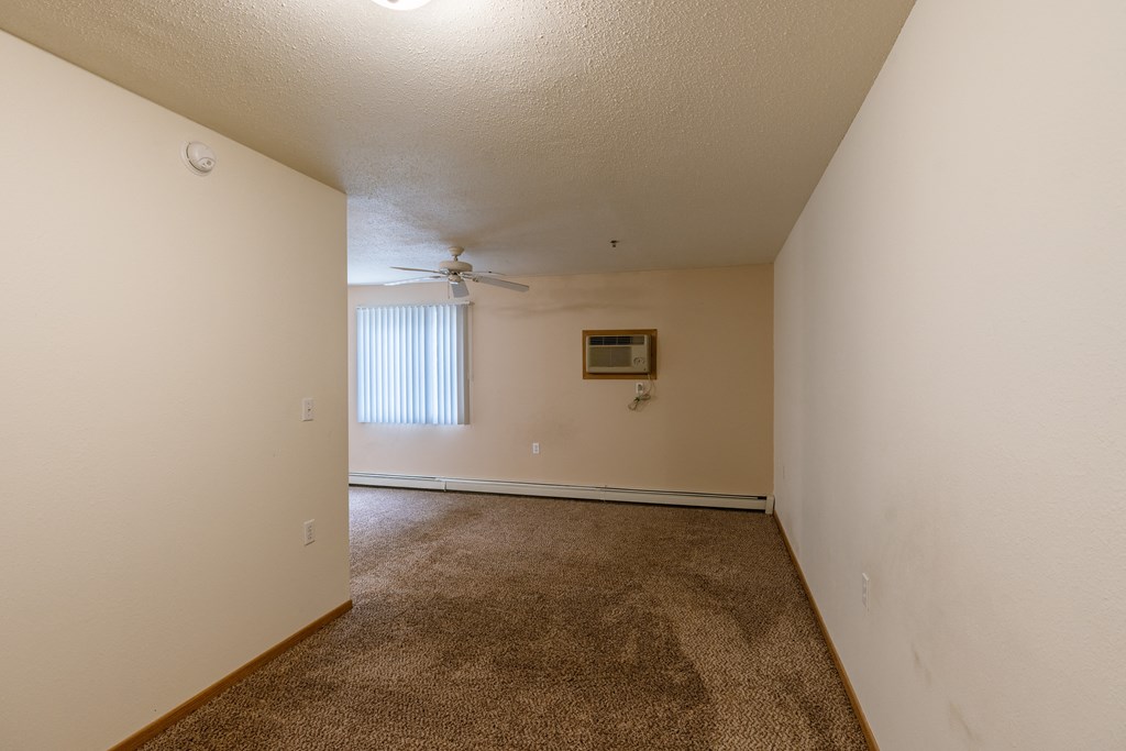 Grand Forks, ND Creekside Apartments. A bedroom area of a studio apartment.