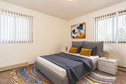 Grand Forks, ND Grandview I Apartments | Bedroom Grand Forks, ND Grandview I Apartments. a bedroom with a bed and two windows