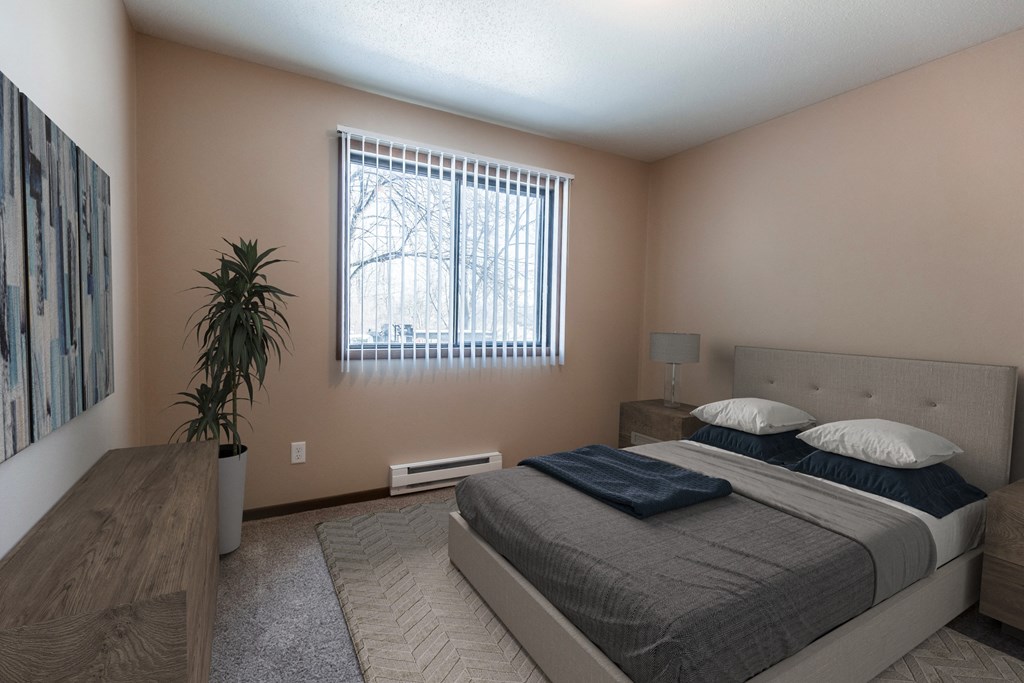 Grand Forks, ND Library Lane Apartments. a bedroom with a bed and a window