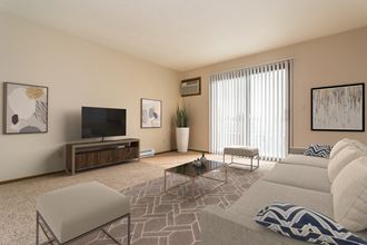 Grand Forks, ND Ridgemont Apartments. a living room with beige walls and a large glass slidng door - Photo Gallery 3