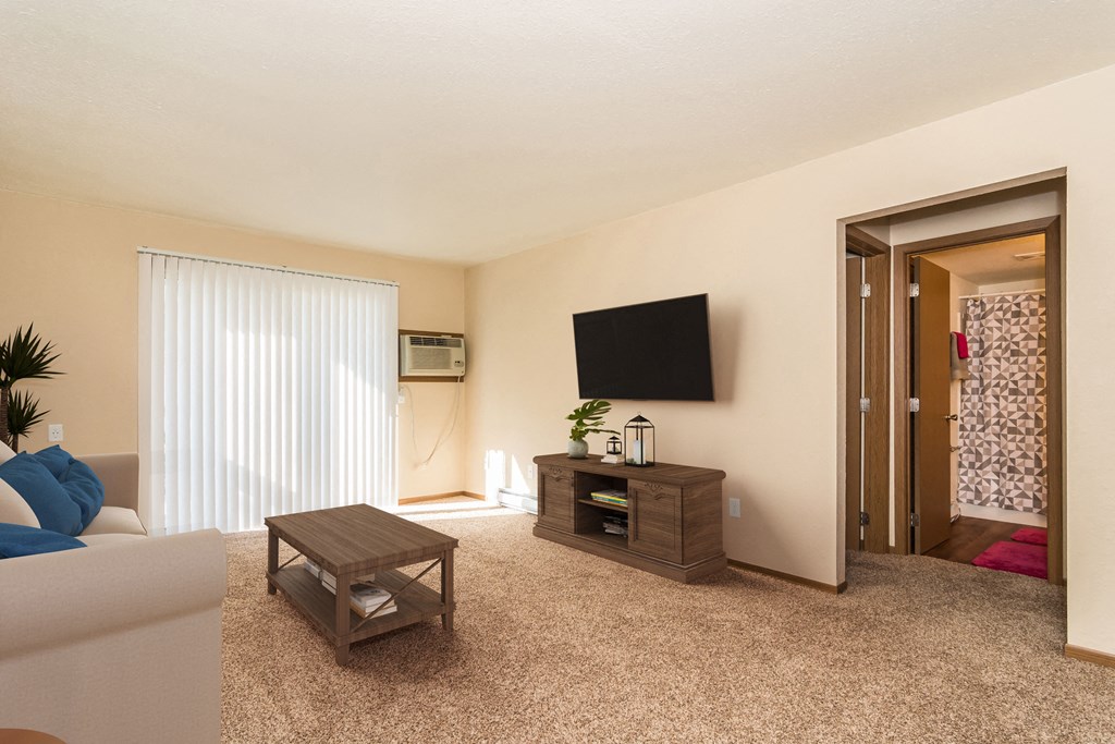 Grand Forks, ND Stanford Court Apartments  a living room with a couch and a coffee table