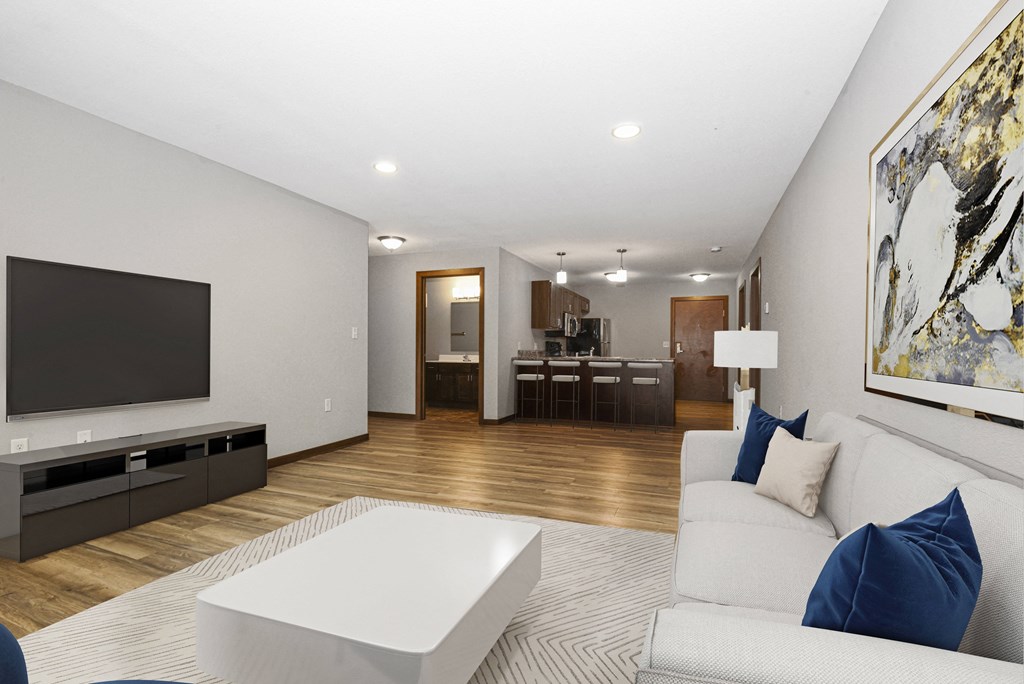 Georgetown on the River Apartments, Fridley, Minnesota. a living room with a couch and a coffee table.