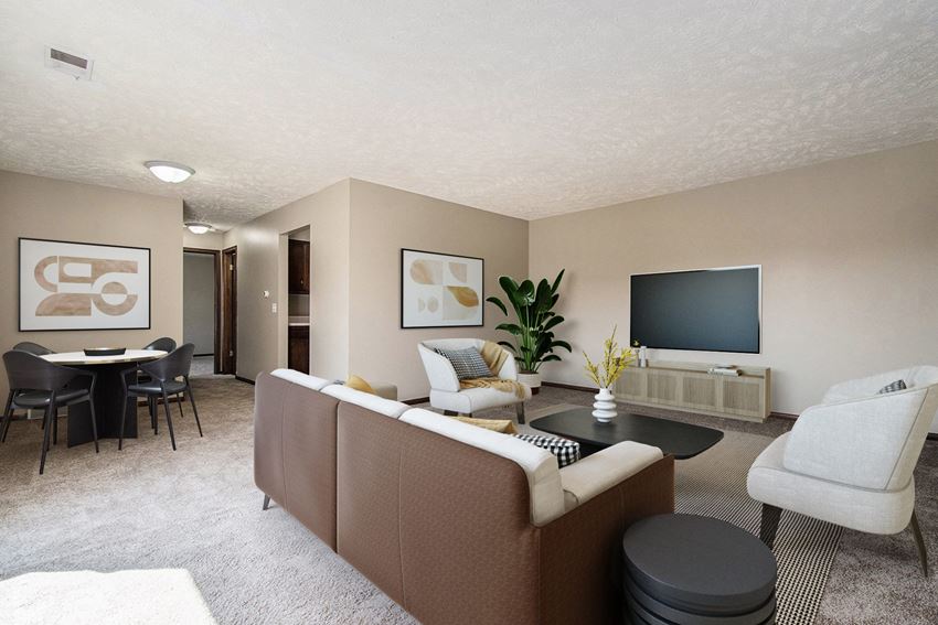 Omaha, NE Maple Ridge Apartments| Living Omaha, NE Maple Ridge Apartments. A living room filled with furniture and a flat screen tv