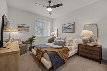 a bedroom with a bed and a ceiling fanat Westbury Apartments, Rancho Cucamonga, CA, 91739