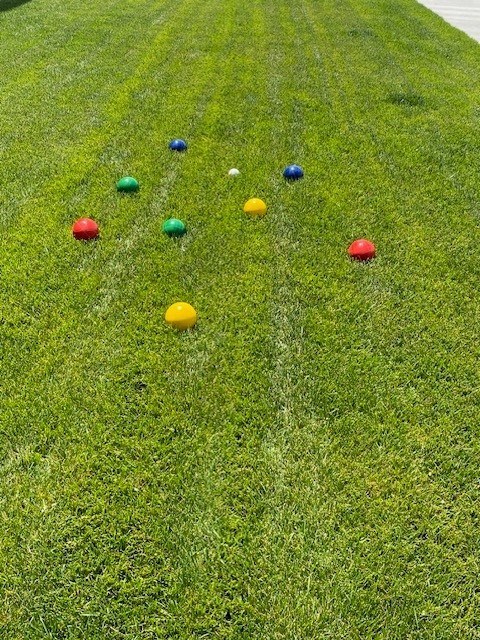 a group of colored balls in the grassat Westbury Apartments, Rancho Cucamonga, 91739