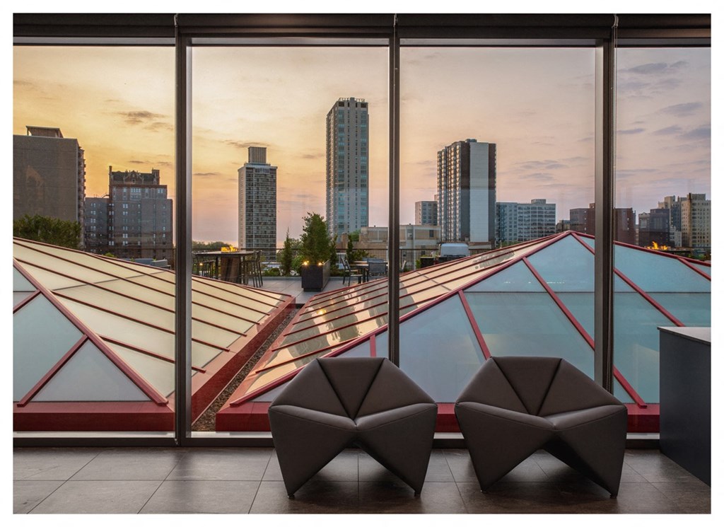 the view of the city from the top of a building