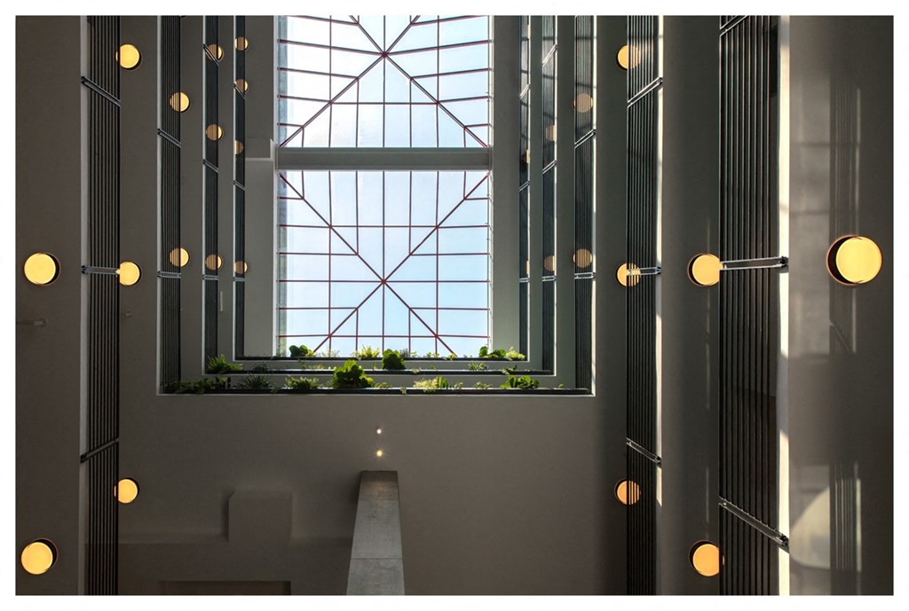 a view of a large window from the lobby of a building