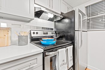 Stainless steel appliances in our updated kitchens - Photo Gallery 3