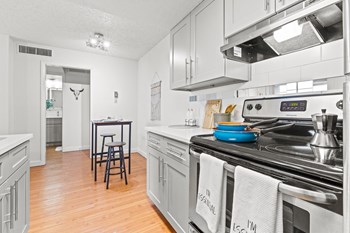 Kitchen and dining Updated cabinets and countertops - Photo Gallery 4