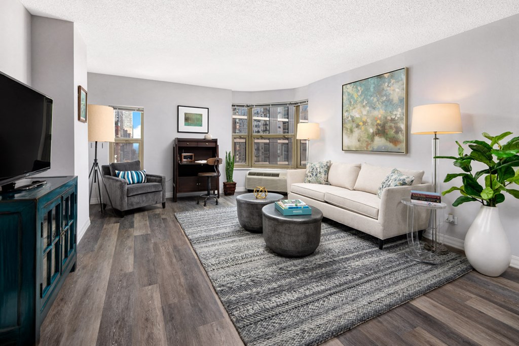 a living room with a couch and a tv