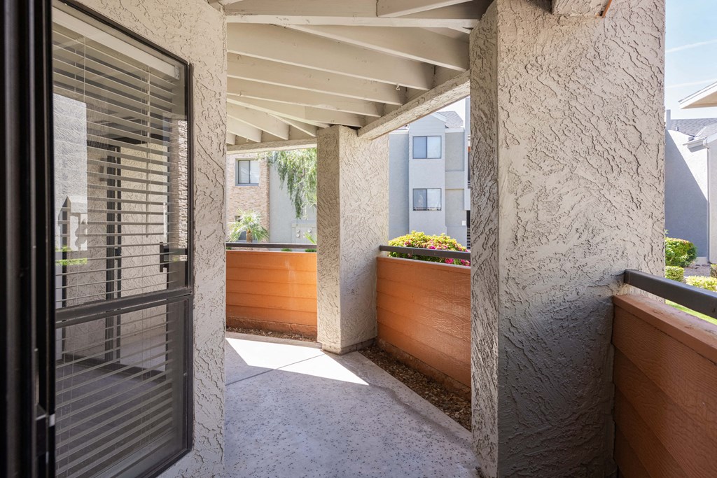 the entrance to a house with a courtyard and a door