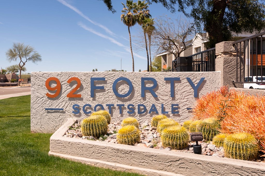 the sign at the entrance of 92 forty seafront apartments