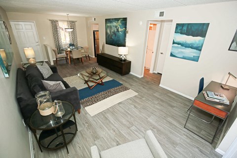 a living room with a couch and a table