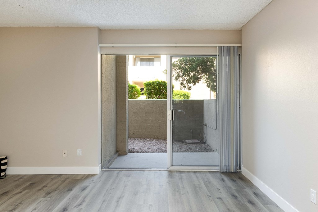 living room with sliding glass doors to an outdoor patio