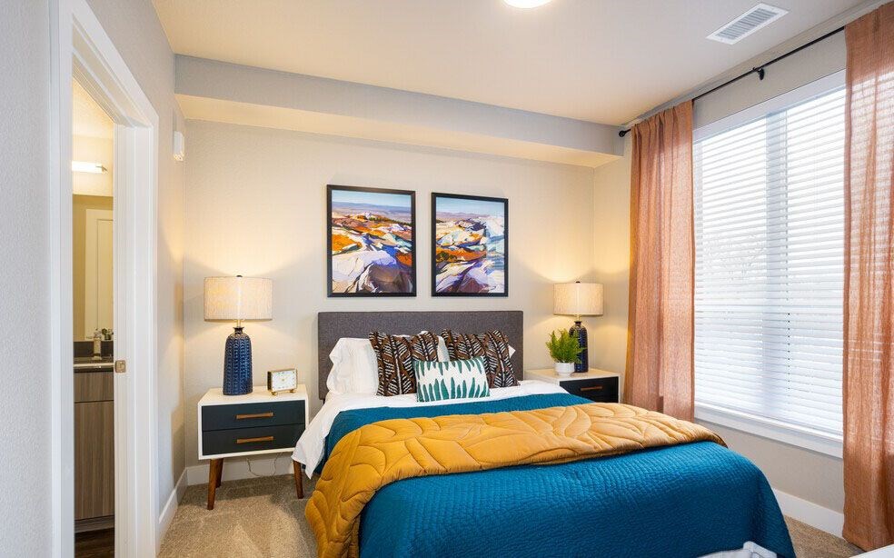 Bedroom with large window to the left